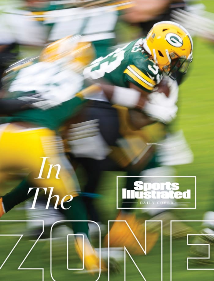 Packers run play on SI Daily Cover about the wide-zone offensive trend